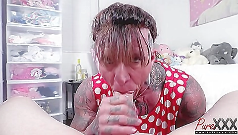 Amazing tattooed woman with a perfect body is having a handjob