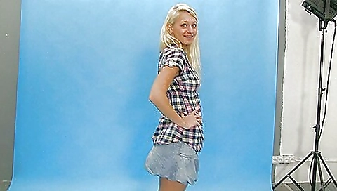 Sexy blonde teen takes off her clothes in a pure play