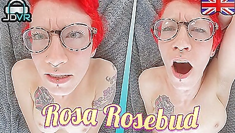 Redheaded hottie with tattooed pussy plays with her pussy