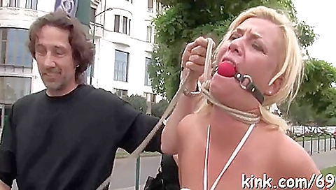 Busty hot girl and two guys fuck her ass in public outdoor