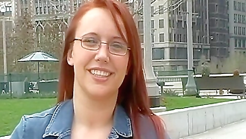 Redhead babe in stockings is getting her big dong licked