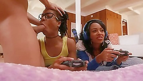 Ebony girls have big tits and long hair on a threesome