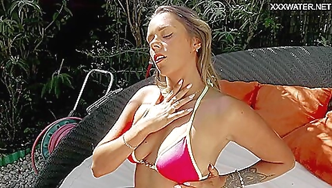 French hottie in swimsuit shows off her hairy pussy and tits