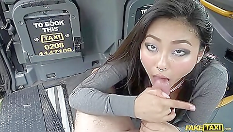 Big tits asian girl rides black taxi driver's cock