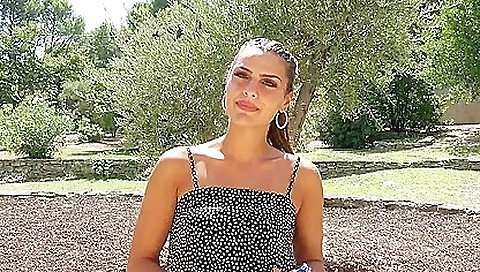 Beautiful brunette teen with a long hair shows off her beauty